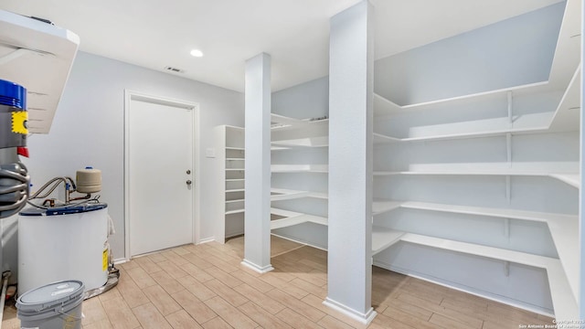 2530 Melrose Cyn, San Antonio, TX 78232 - storage area with water heater