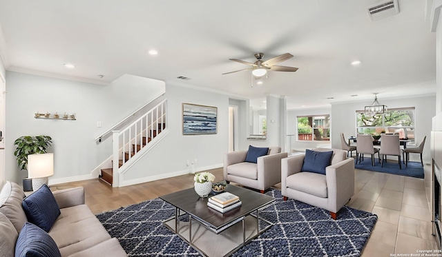 2530 Melrose Cyn, San Antonio, TX 78232 - living area with stairs, a ceiling fan, recessed lighting, crown molding, and a chandelier