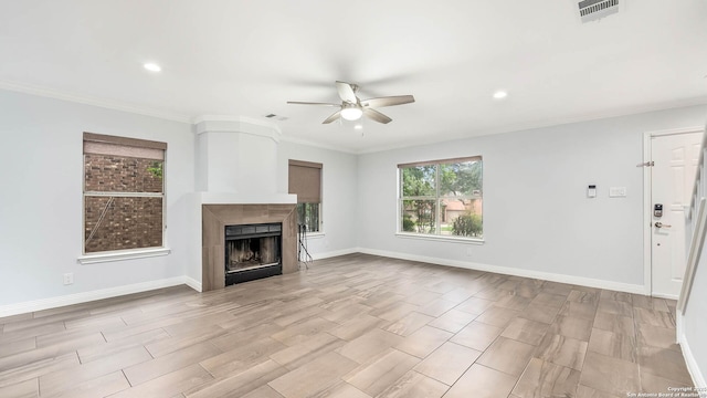 2530 Melrose Cyn, San Antonio, TX 78232 - unfurnished living room with ceiling fan, a fireplace, recessed lighting, and crown molding