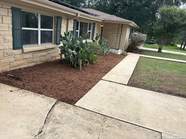 117 Bryker, Terrell Hills, TX 78209 - view of property exterior with stone siding and solar panels