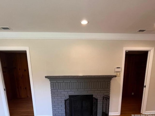 117 Bryker, Terrell Hills, TX 78209 - detailed view of wood finished floors, a fireplace, and recessed lighting