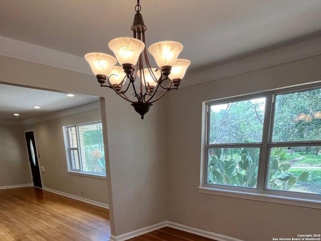 117 Bryker, Terrell Hills, TX 78209 - unfurnished room with wood finished floors, a chandelier, and recessed lighting