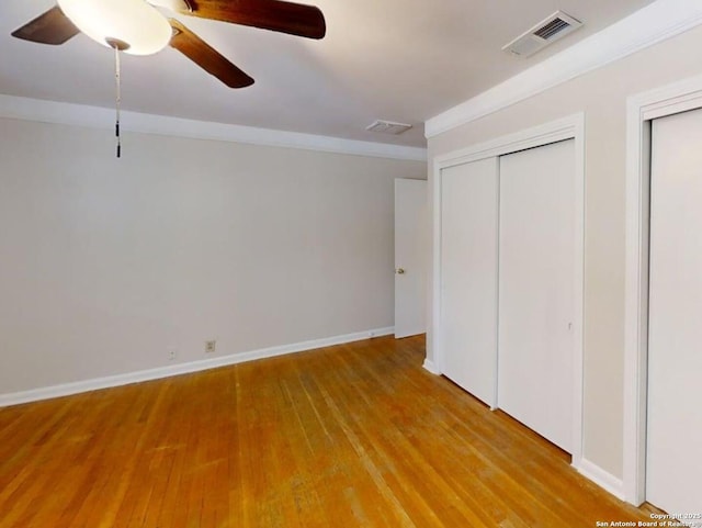 117 Bryker, Terrell Hills, TX 78209 - unfurnished bedroom featuring light wood finished floors and a ceiling fan