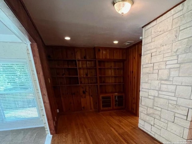 117 Bryker, Terrell Hills, TX 78209 - hallway featuring wood walls, wood finished floors, and recessed lighting