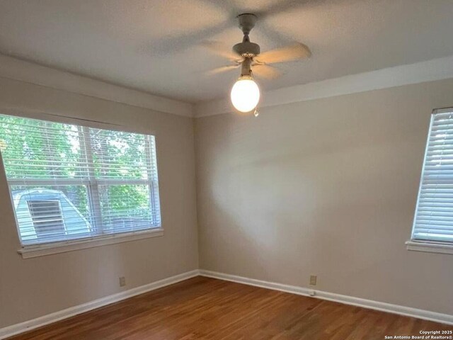 117 Bryker, Terrell Hills, TX 78209 - spare room featuring wood finished floors and ceiling fan