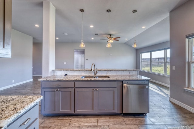 13 Hope, Uvalde, TX 78801 - kitchen featuring stainless steel dishwasher, ceiling fan, gray cabinets, light stone countertops, and decorative light fixtures