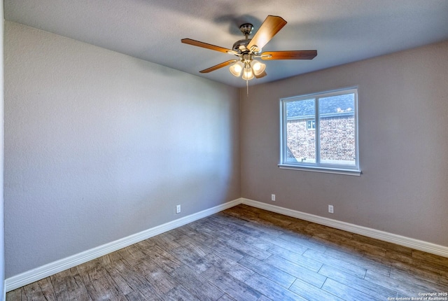 13 Hope, Uvalde, TX 78801 - empty room featuring wood finished floors and a ceiling fan