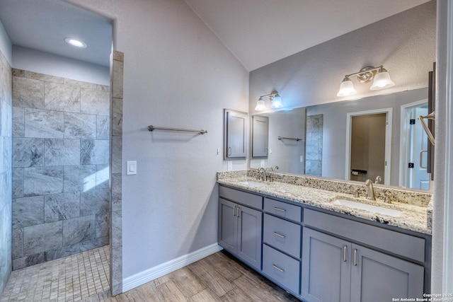 13 Hope, Uvalde, TX 78801 - full bath with walk in shower, double vanity, lofted ceiling, and wood finished floors