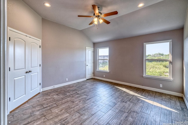 13 Hope, Uvalde, TX 78801 - unfurnished bedroom with lofted ceiling, wood finished floors, recessed lighting, and ceiling fan