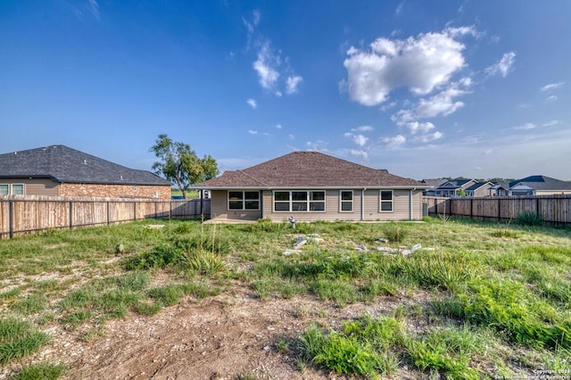 13 Hope, Uvalde, TX 78801 - back of house featuring a fenced backyard