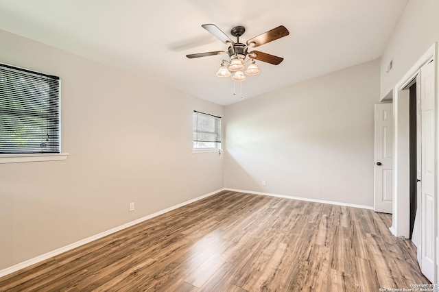 142 Winn, Universal City, TX 78148 - unfurnished bedroom featuring wood finished floors and a ceiling fan