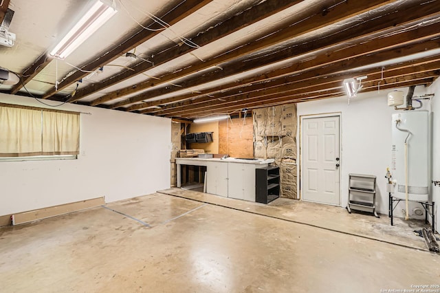 142 Winn, Universal City, TX 78148 - unfinished basement featuring gas water heater and a workshop area