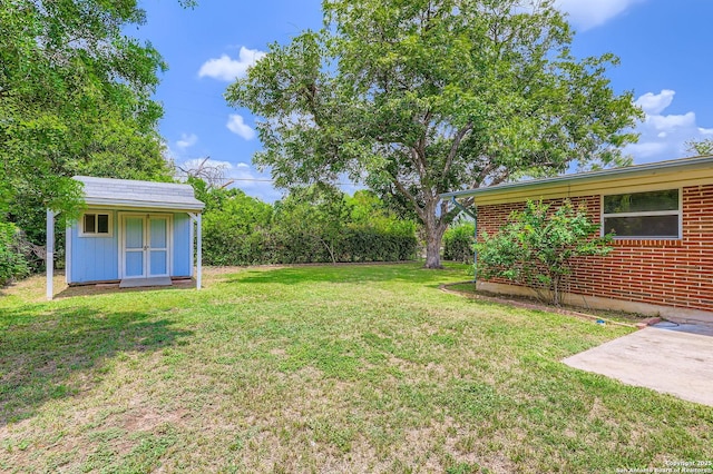 142 Winn, Universal City, TX 78148 - view of grassy yard with a storage unit