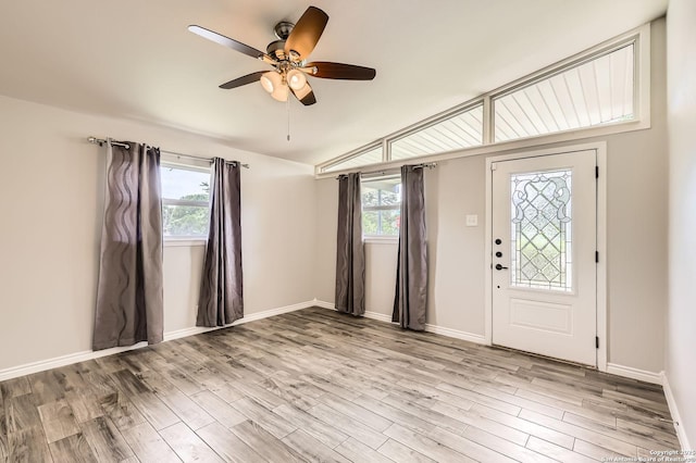 142 Winn, Universal City, TX 78148 - foyer entrance featuring ceiling fan, wood finished floors, and vaulted ceiling