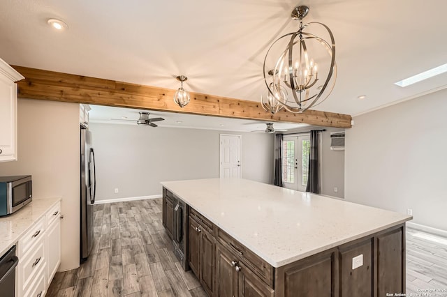 142 Winn, Universal City, TX 78148 - kitchen with a ceiling fan, appliances with stainless steel finishes, white cabinets, wood finished floors, and recessed lighting