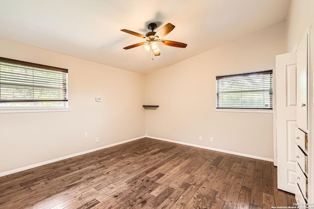 142 Winn, Universal City, TX 78148 - spare room with vaulted ceiling, a ceiling fan, healthy amount of natural light, and dark wood-type flooring