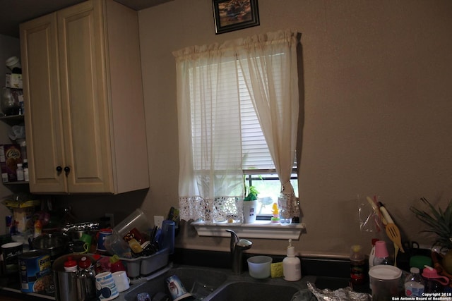 401 W Lindbergh Blvd, Universal City, TX 78148 - kitchen featuring white cabinetry
