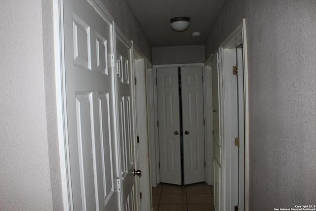 401 W Lindbergh Blvd, Universal City, TX 78148 - corridor with tile patterned floors