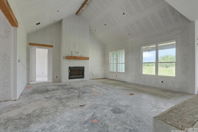 133 Wild Persimmon Trl, Marion, TX 78124 - unfurnished living room featuring high vaulted ceiling, a fireplace, and beamed ceiling
