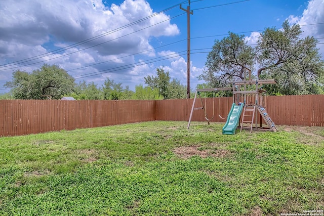 12870 Limestone, San Antonio, TX 78253 - fenced backyard featuring a playground