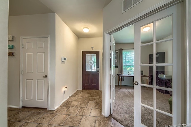 12870 Limestone, San Antonio, TX 78253 - entrance foyer featuring baseboards and stone tile flooring