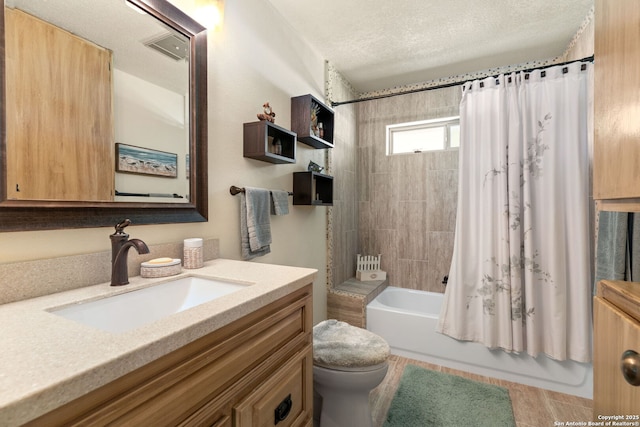 479 Park Rd 23, Blanco, TX 78606 - bathroom featuring vanity, shower / bathtub combination with curtain, and a textured ceiling