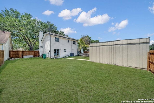 808 Fern Mdw, Universal City, TX 78148 - rear view of house featuring a fenced backyard and a chimney