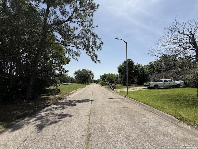 4718 Scenic, Houston, TX 77048 - view of concrete street featuring street lighting and curbs