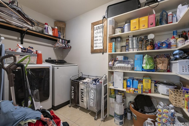 11862 Barkston, San Antonio, TX 78253 - laundry area featuring washing machine and dryer and light tile patterned flooring
