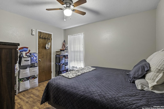 1245 Whitney, Pleasanton, TX 78064 - bedroom with wood finished floors and a ceiling fan