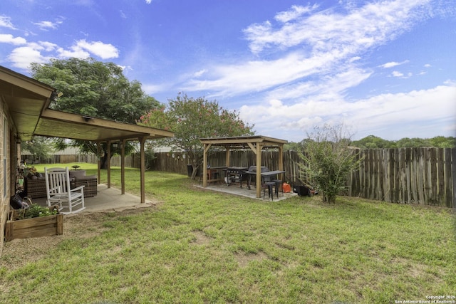1245 Whitney, Pleasanton, TX 78064 - fenced backyard featuring a gazebo and a patio area