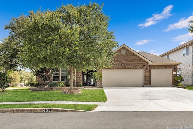435 Red Quill Nest, San Antonio, TX 78253 - view of front of property featuring brick siding, an attached garage, concrete driveway, and a front lawn