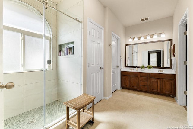 435 Red Quill Nest, San Antonio, TX 78253 - full bath with double vanity, a stall shower, and tile patterned floors