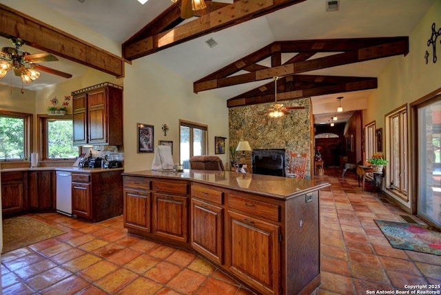 142 Four Bears Trl, Kerrville, TX 78028 - kitchen featuring beam ceiling, open floor plan, healthy amount of natural light, a ceiling fan, and dishwasher
