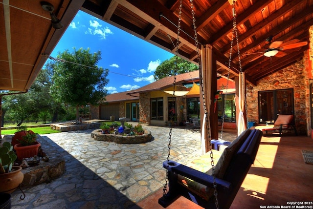 142 Four Bears Trl, Kerrville, TX 78028 - view of patio featuring a ceiling fan and an attached garage