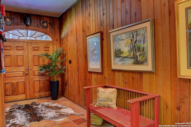 142 Four Bears Trl, Kerrville, TX 78028 - tiled entrance foyer with wooden walls