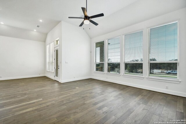409 Dulce Vis, Boerne, TX 78006 - spare room featuring vaulted ceiling, dark wood-style flooring, ceiling fan, and recessed lighting
