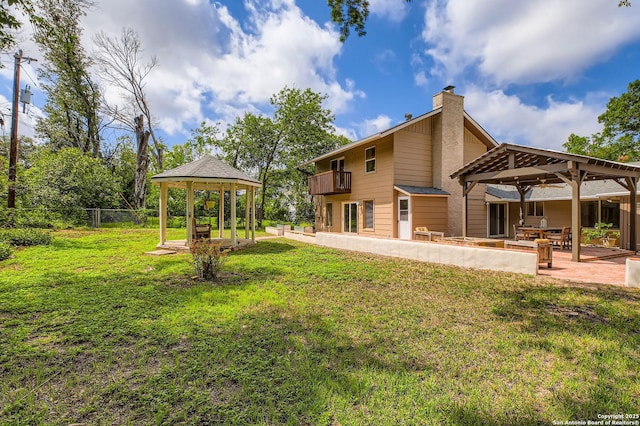 547 Patricia, San Antonio, TX 78216 - rear view of property featuring a gazebo, a chimney, and a patio
