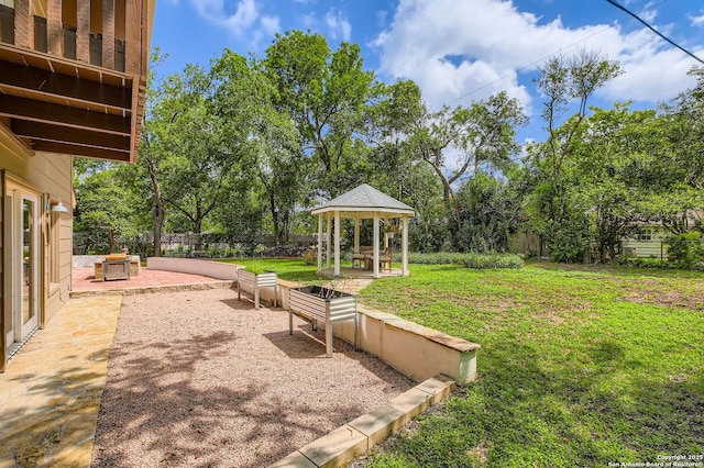 547 Patricia, San Antonio, TX 78216 - view of yard featuring a gazebo, view of wooded area, and a patio area