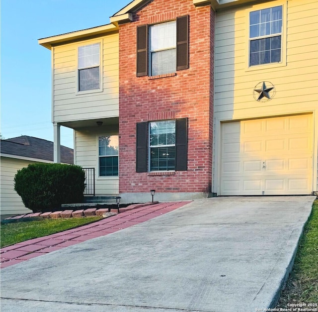 5742 Butch Cyn, San Antonio, TX 78252 - view of front of property with brick siding, a garage, and driveway