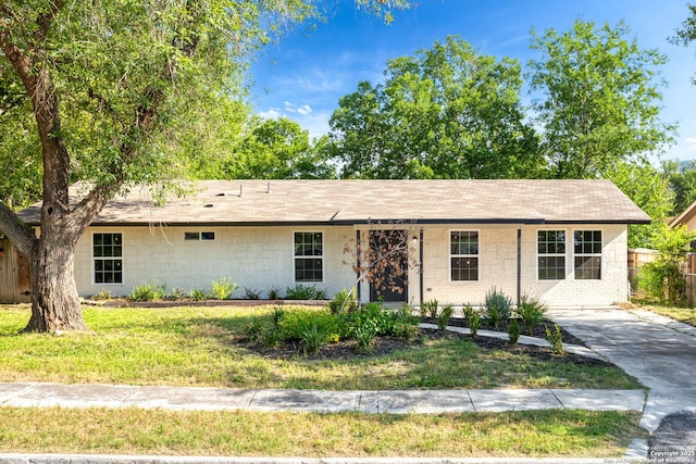 8810 Flint Vly, San Antonio, TX 78227 - ranch-style home with a shingled roof and a front yard