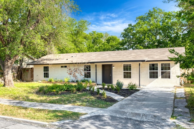 8810 Flint Vly, San Antonio, TX 78227 - ranch-style home with concrete driveway, roof with shingles, and concrete block siding