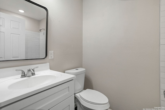 8810 Flint Vly, San Antonio, TX 78227 - bathroom featuring vanity and a textured wall