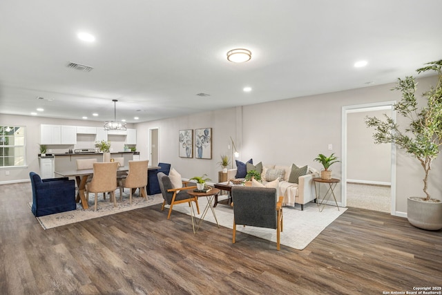8810 Flint Vly, San Antonio, TX 78227 - living area with recessed lighting, dark wood-style flooring, and a chandelier