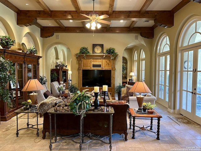 107 Geddington, Shavano Park, TX 78249 - living area with beamed ceiling, french doors, a ceiling fan, coffered ceiling, and arched walkways