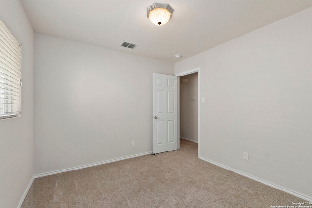9218 Pacific Maple, San Antonio, TX 78254 - empty room with carpet floors and a smoke detector