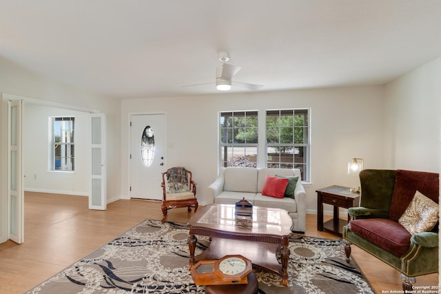 2743 Fairview, Canyon Lake, TX 78133 - living area featuring plenty of natural light, light wood-type flooring, and a ceiling fan