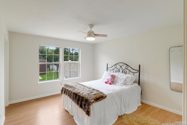2743 Fairview, Canyon Lake, TX 78133 - bedroom featuring light wood-style flooring and a ceiling fan