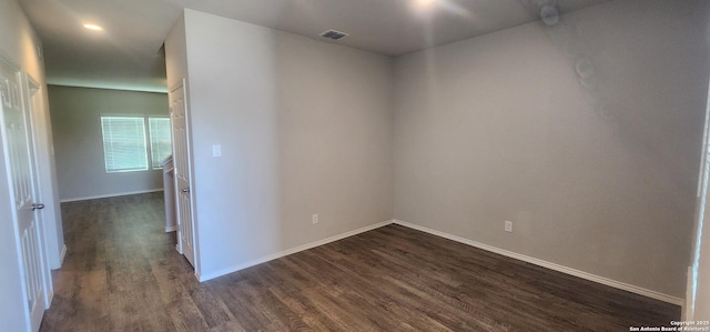 7115 Mesa Clfs, Converse, TX 78109 - spare room with dark wood-style floors and baseboards