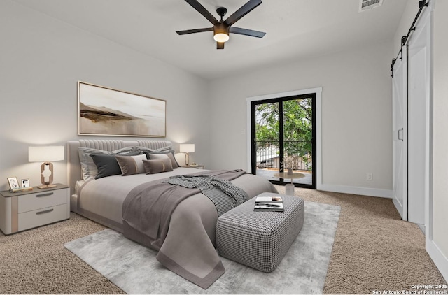 302 Bank, San Antonio, TX 78204 - bedroom featuring a barn door, access to exterior, light carpet, and a ceiling fan